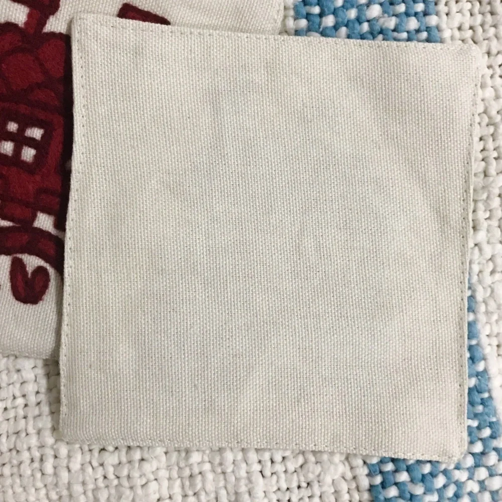 Williams Sonoma hand stitched crewel coaster set